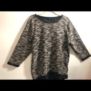 Black and Cream Sweater with mid cuffed sleeves.